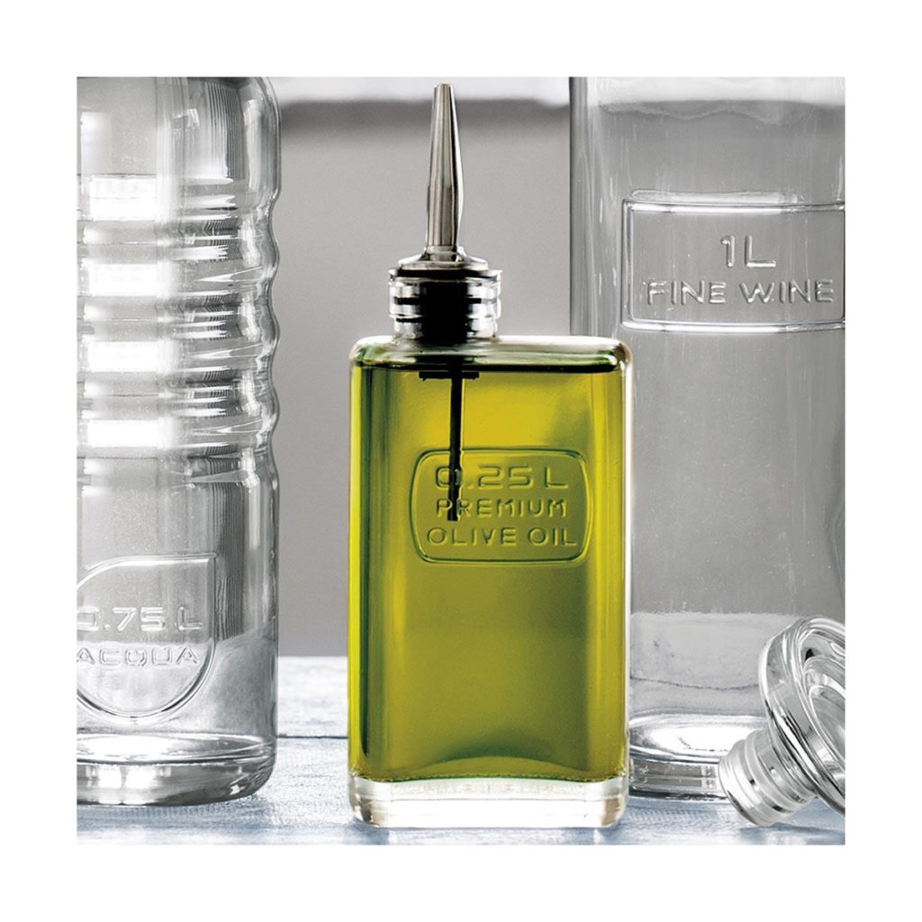 A filled olive oil bottle by Luigi Bormioli.